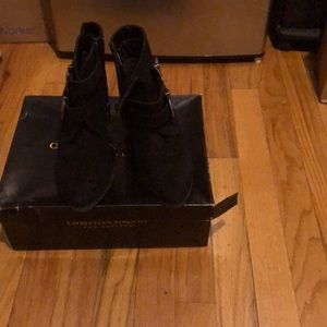 Black suede ankle boots .With Buckle and zipper